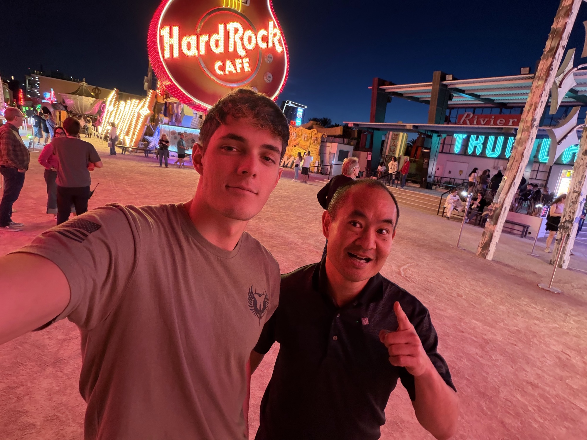 Elias Bartu and Dennis Yu at the Neon Museum at dusk