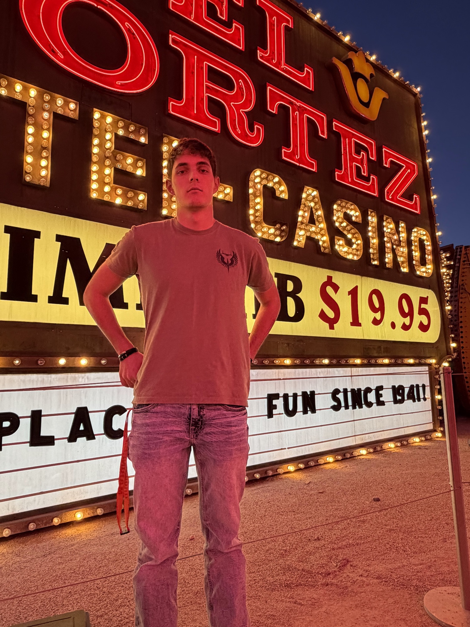 Elias under the El Cortez neon sign